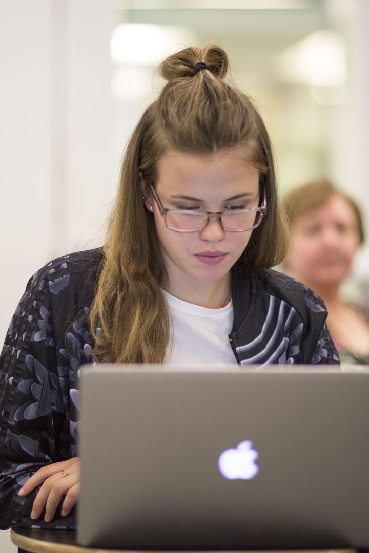 LaunchCode learner working on a laptop